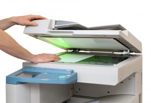 Scanner copying recipes for a fundraising cookbook