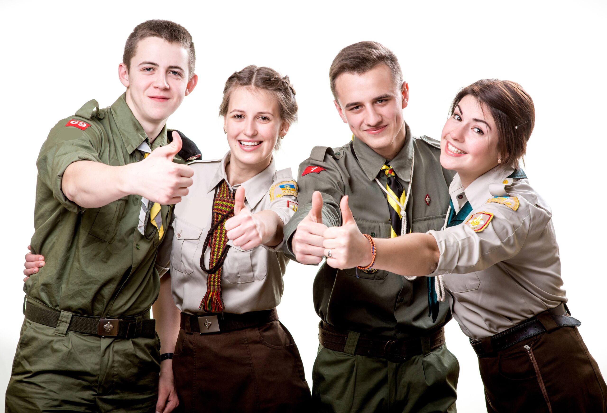 Scouts giving thumbs up to their scout fundraising cookbook
